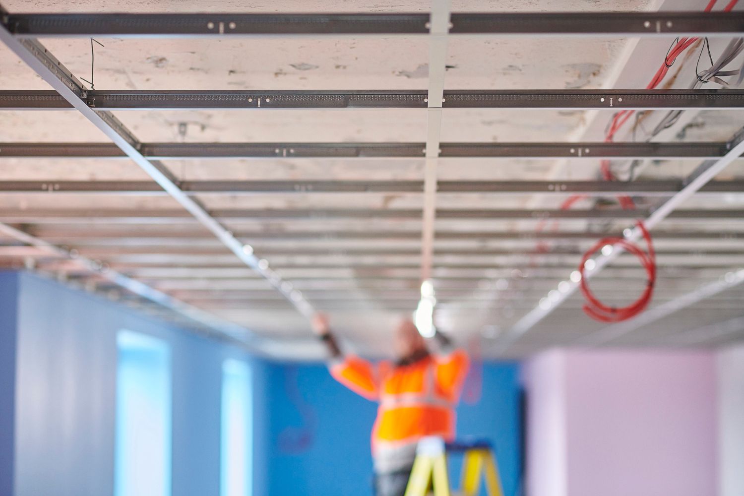 Installing a Suspended Ceiling: A Factor in Drop Ceiling Cost