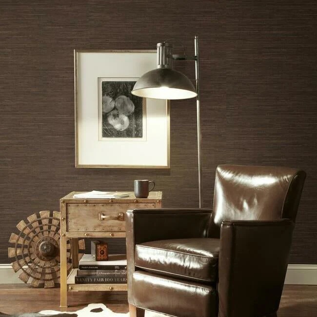 Bay Brown colored wallpaper in room with leather chair.
