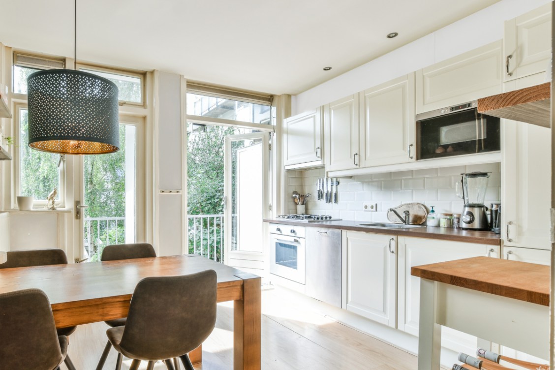 9 Paint Colors for Small Kitchens That Open Up the Room