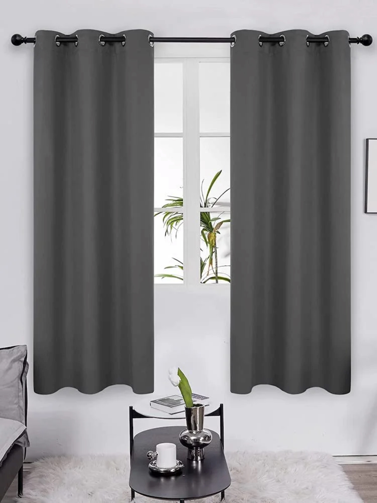 Black thermal curtains in home.