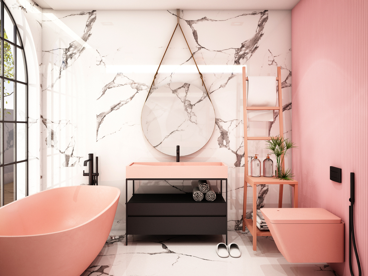 A-pink-and-marble-bathroom-has-black-accents-and-fixtures.