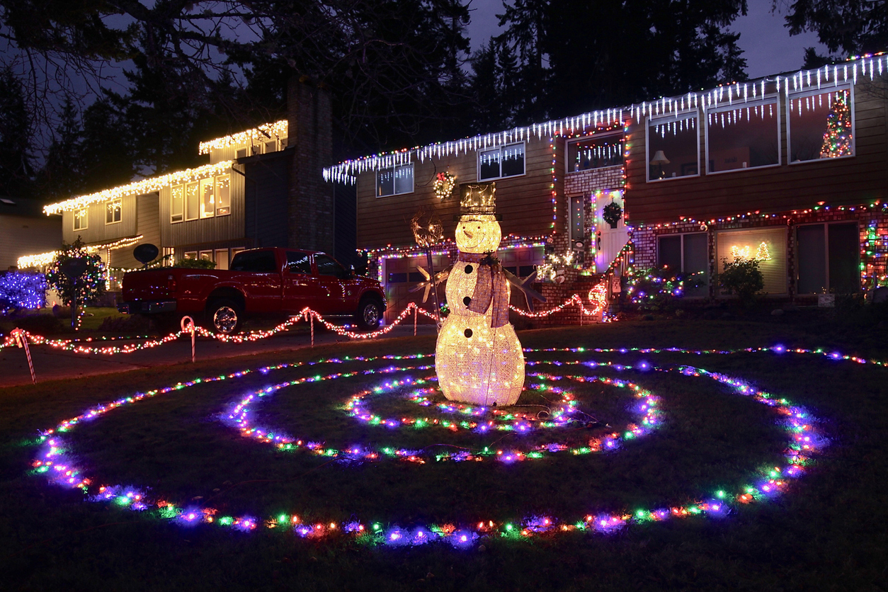 Lighted Christmas yard decorations in the neighborhood