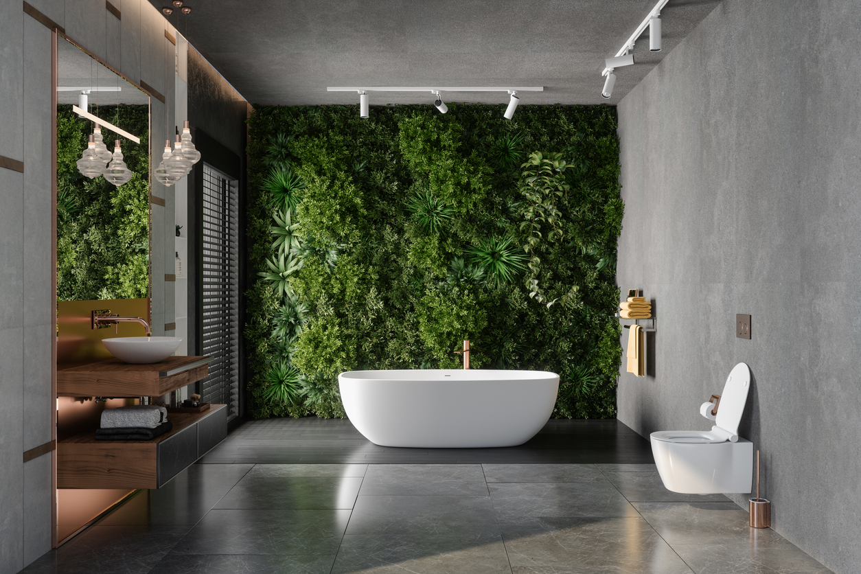 Luxury Bathroom Interior With Bathtub, Toilet, Mirror And Vertical Garden