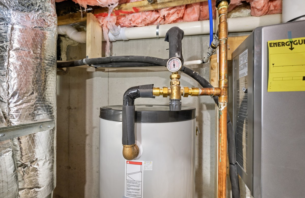 Thermostatic mixing valve regulating temperature for home's hot water to a safe level