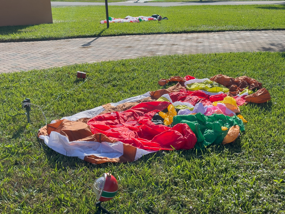 Deflated Christmas decoration in the front yard, Plantation, Florida, USA