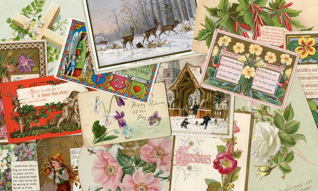 A pile of old Christmas and greeting cards