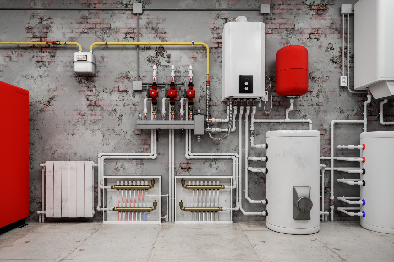 The best heat pump water heater installed in a tidy garage with brick walls.