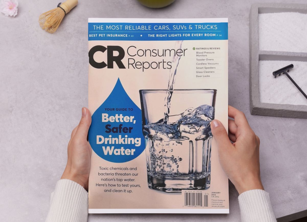 Woman reading Consumer Reports