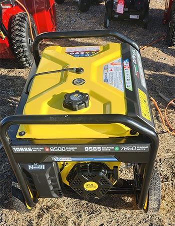 Yellow and black Champion dual-fuel generator sitting on dirt path next to other portable generators