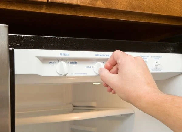 Turning down the temperature on a fridge