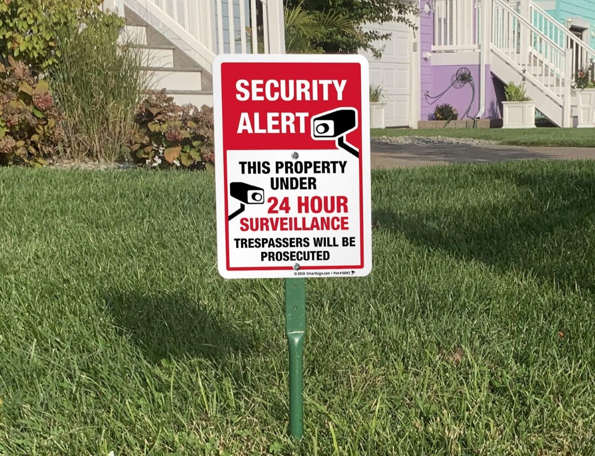 Security sign on lawn.
