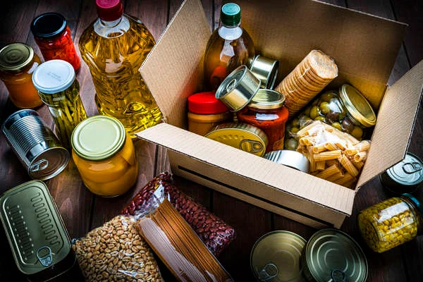 close up of non-perishable food items in a box