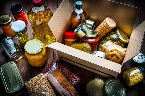 close up of non-perishable food items in a box