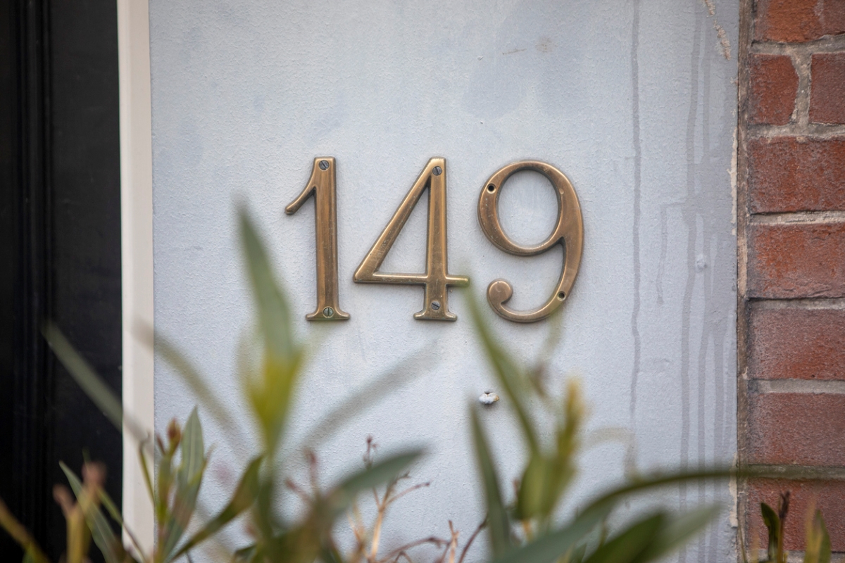 Large gold house numbers.