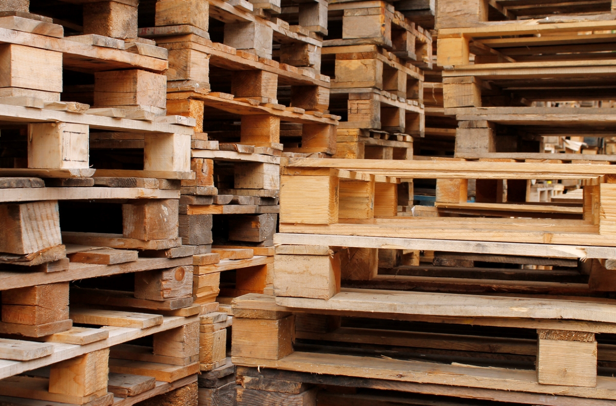 Stacks of wooden pallets.