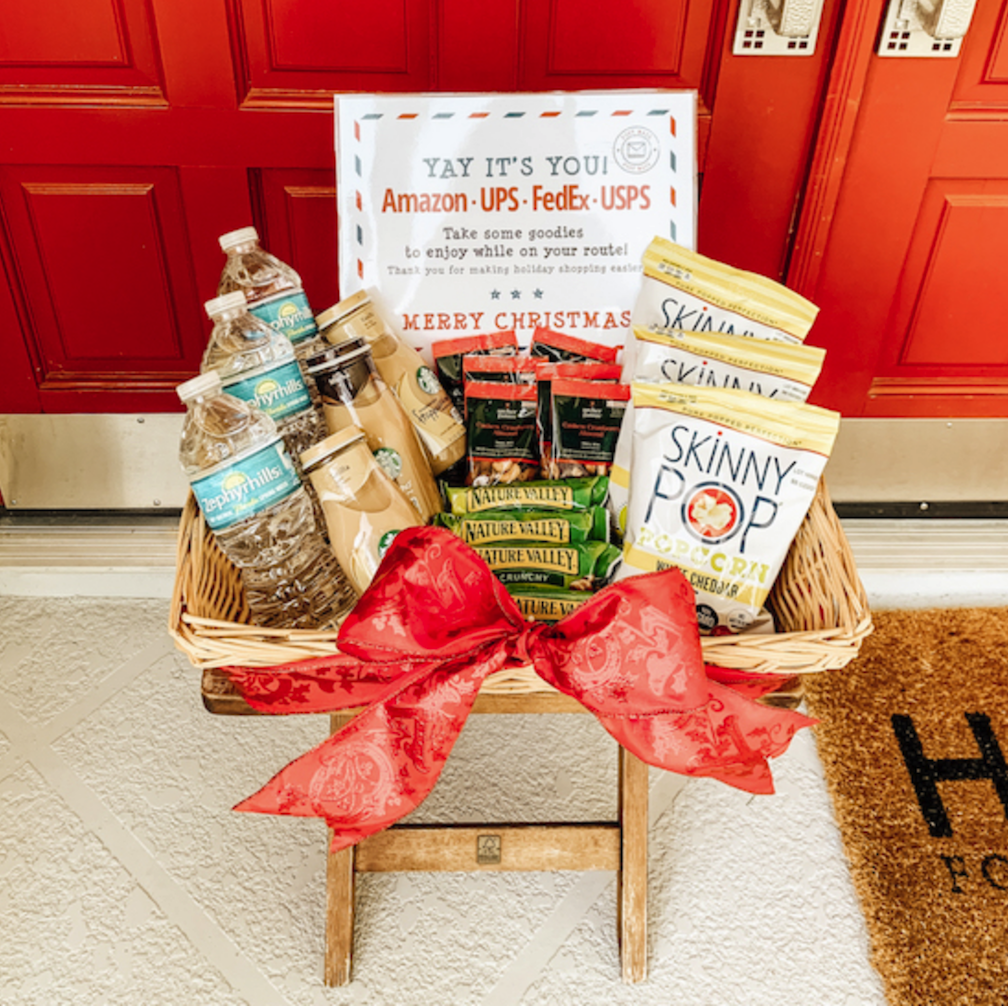 box of treats for delivery drivers on front porch