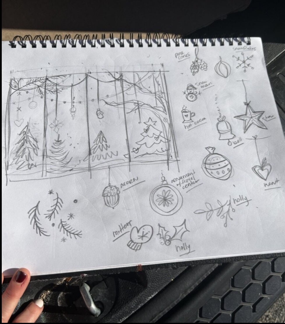 A sketch shows a winter themed mural with details of the planned design.