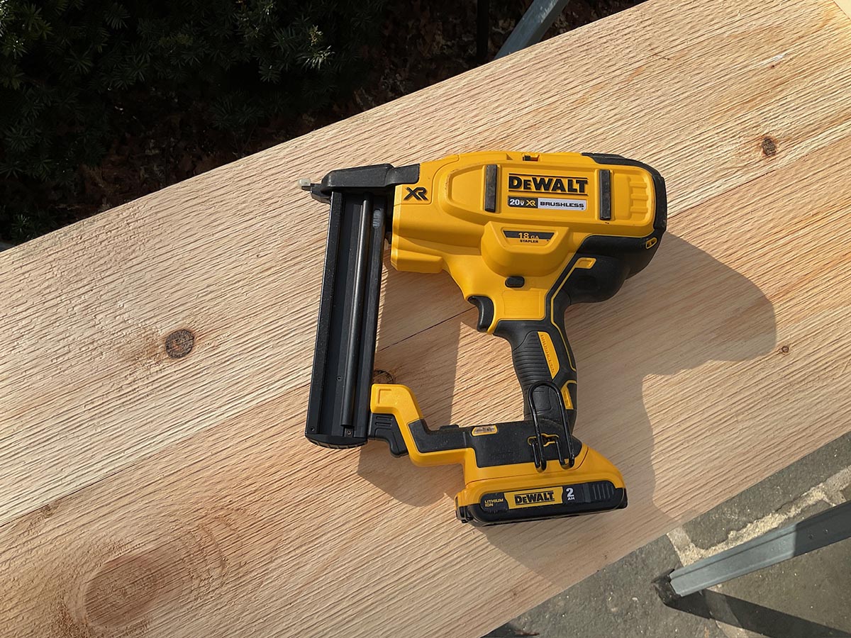 The DeWalt Crown Stapler on a piece of wood during hands-on testing.