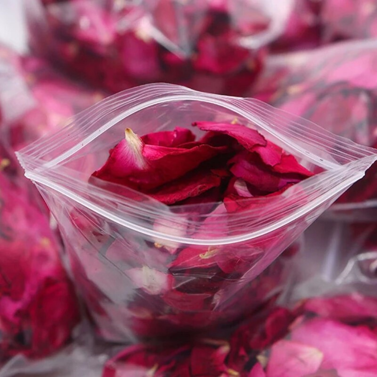 Dried roses in plastic bag.