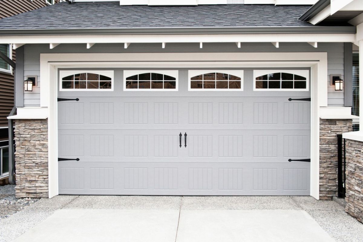 A set of high-end garage doors painted with the best paint for garage doors.