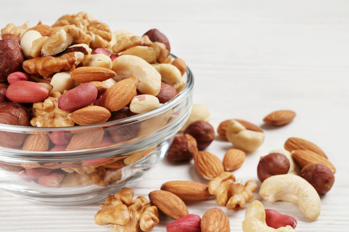 Glass bowl of mixed nuts.