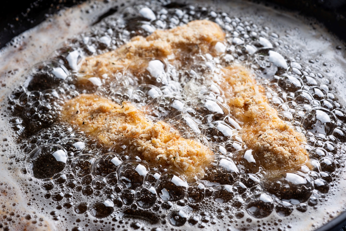 Food frying in pan.