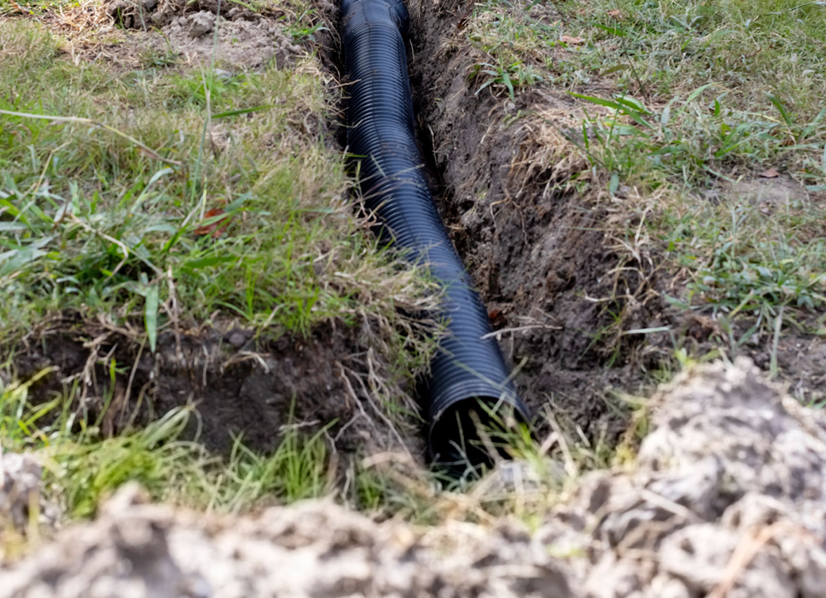 A French drain installed in a residential yard.