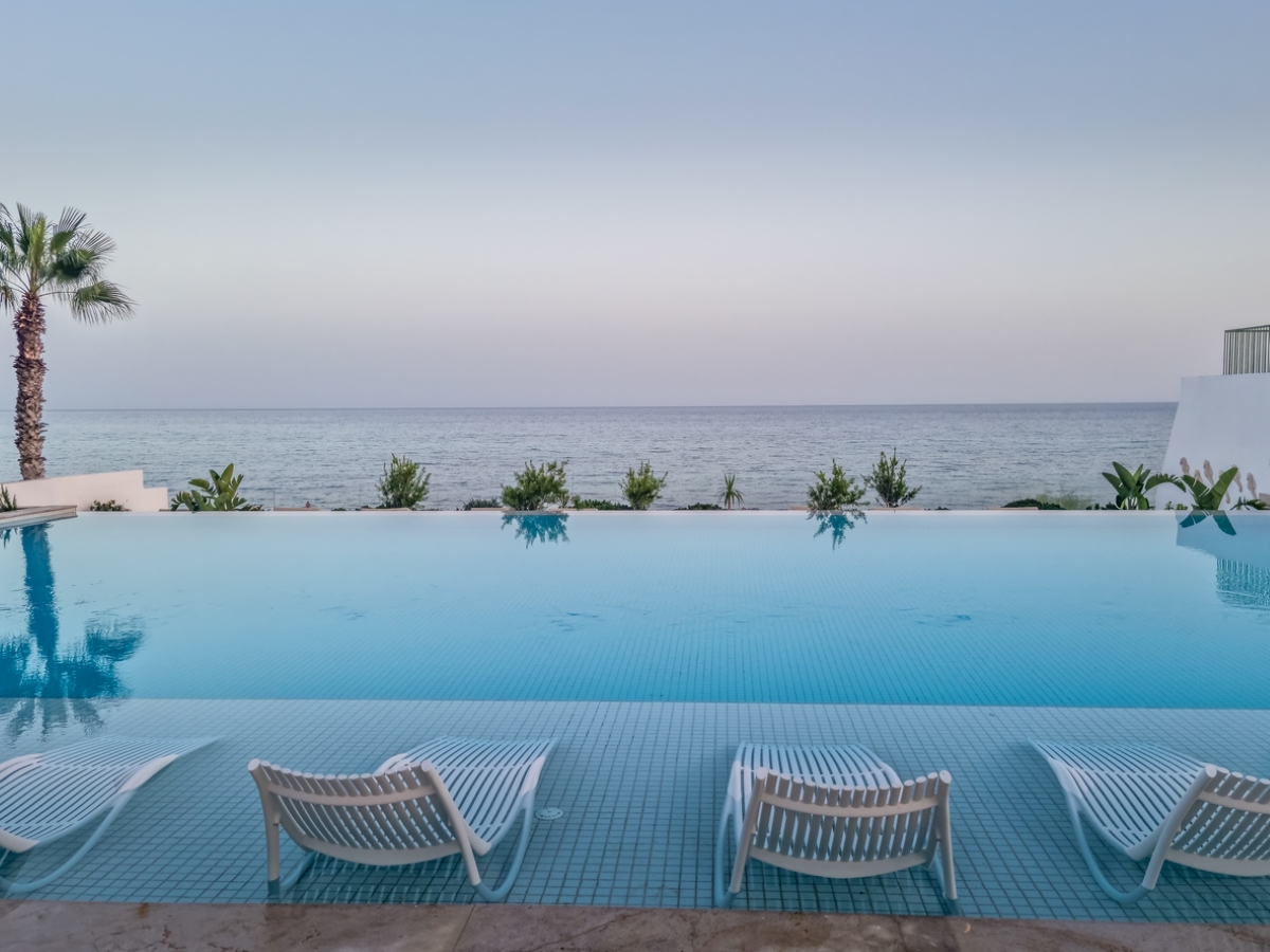 Infinity pool with view of sea.