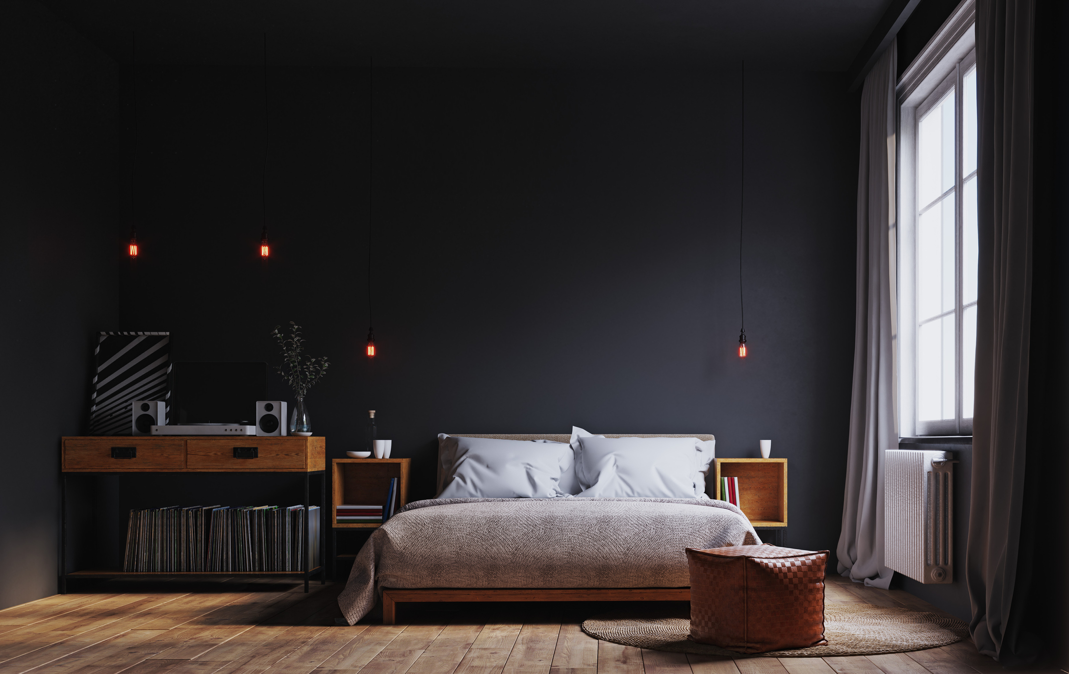 Minimalist bedroom with white linens on bed and matching, dark grey ceilings and walls.