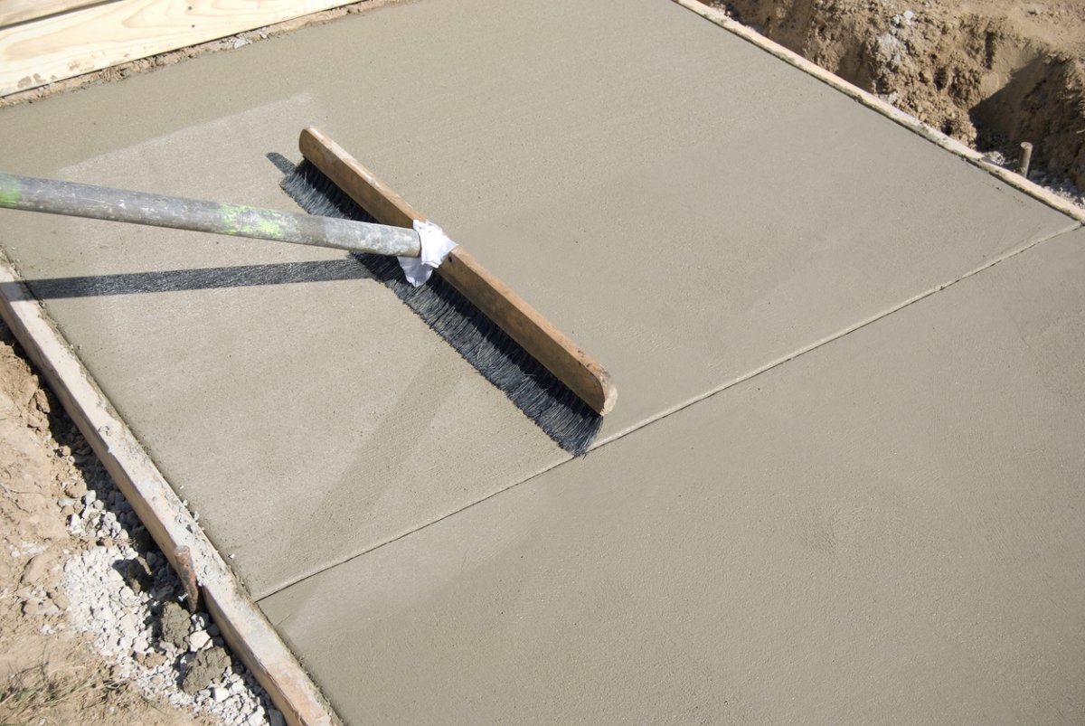 Recently poured concrete patio with broom