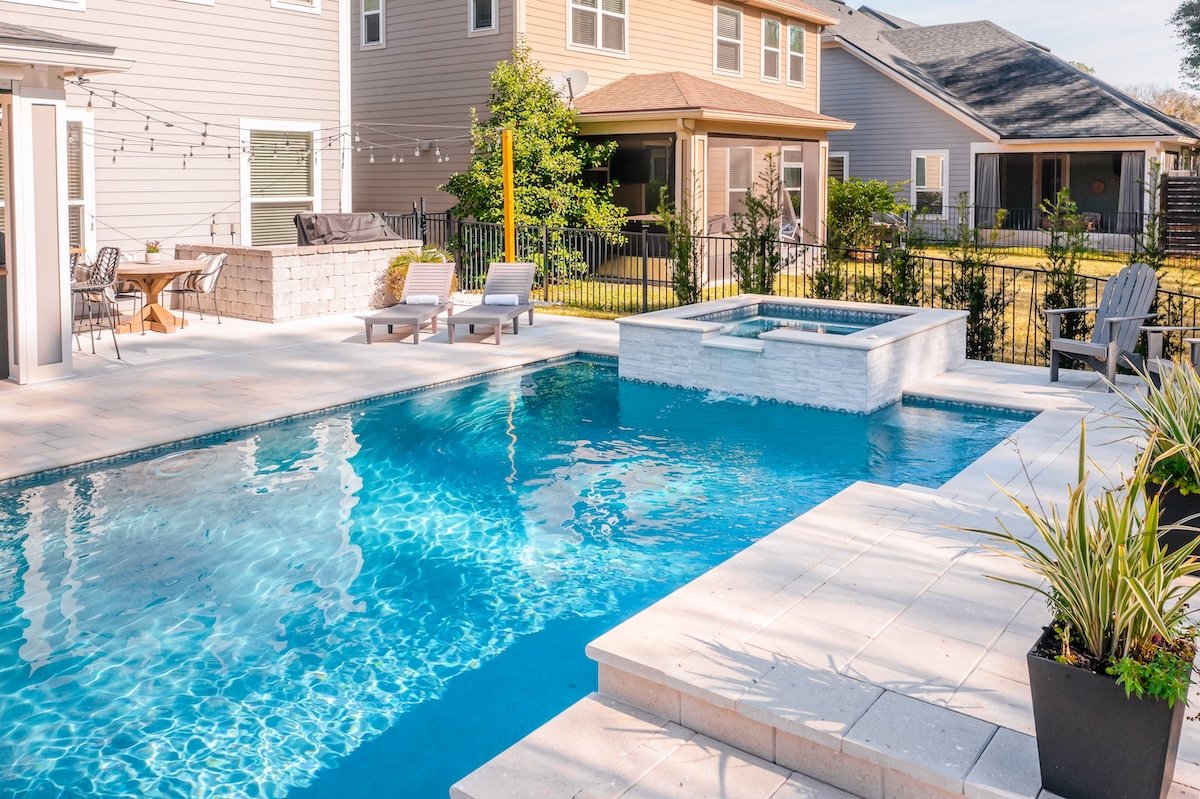 Beautiful Backyard With A New Pool On A Hot Summer Day