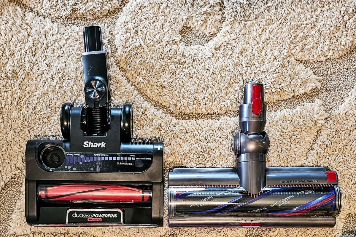The cleaning heads of Dyson vs Shark on a rug before head-to-head testing.