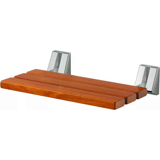 A wood slat seat has metal hinges to allow folding down from the wall.