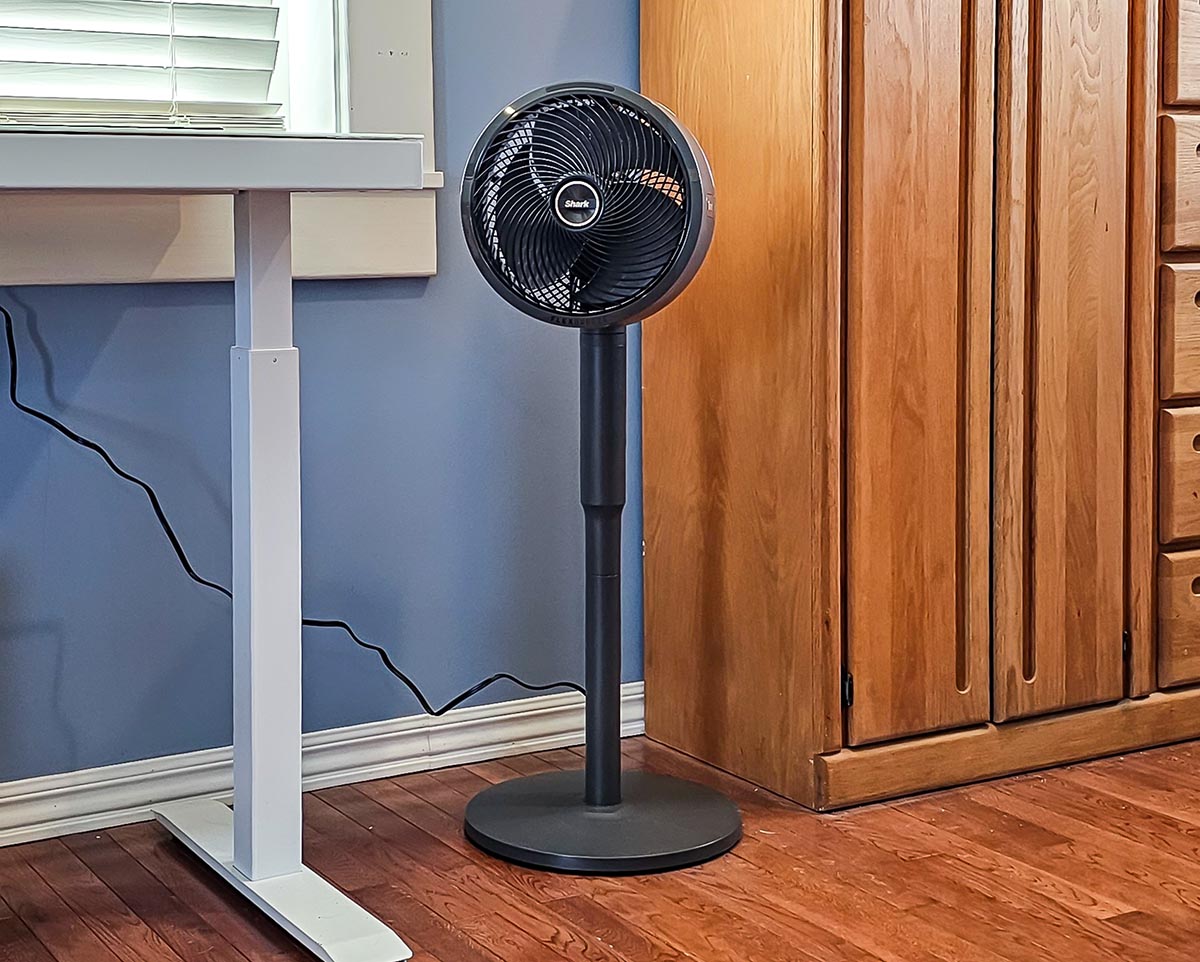 Shark FlexBreeze Fan with InstaCool Set up next to a standing desk during testing.