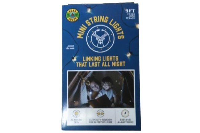 A box of mini string lights shows a pair of kids camping.