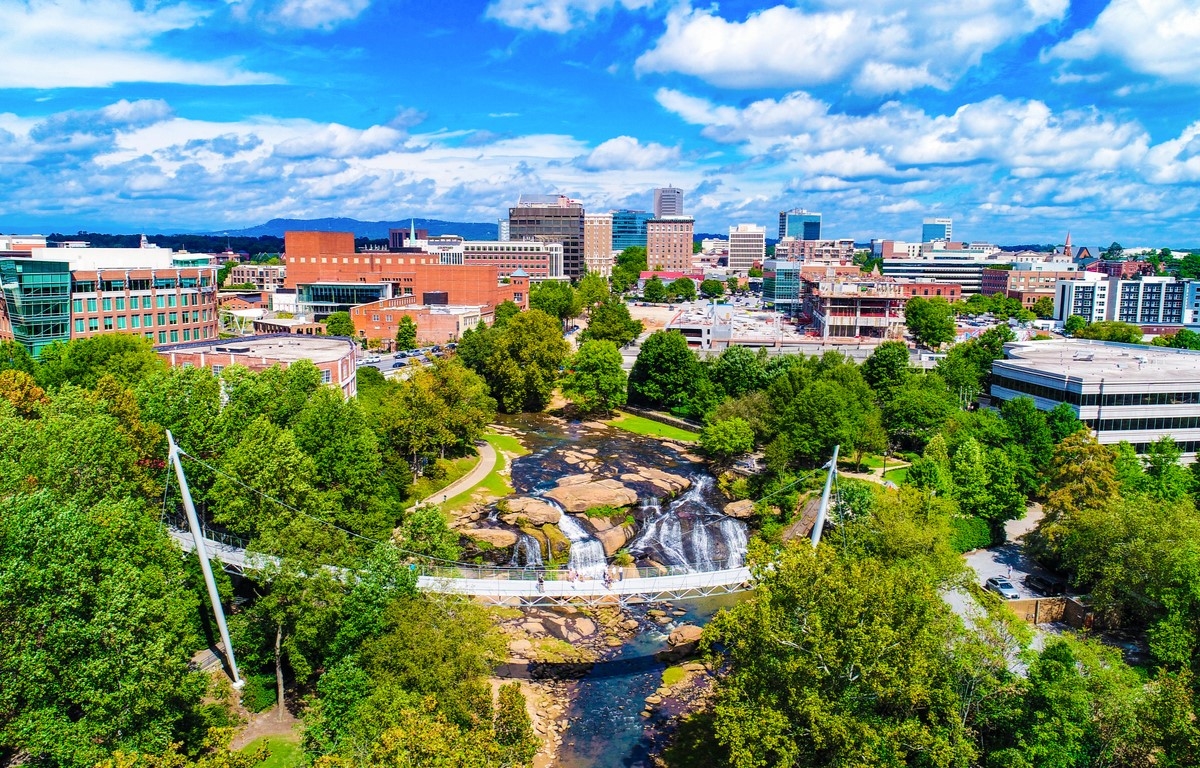 City of Greenville with many trees surrounding area.