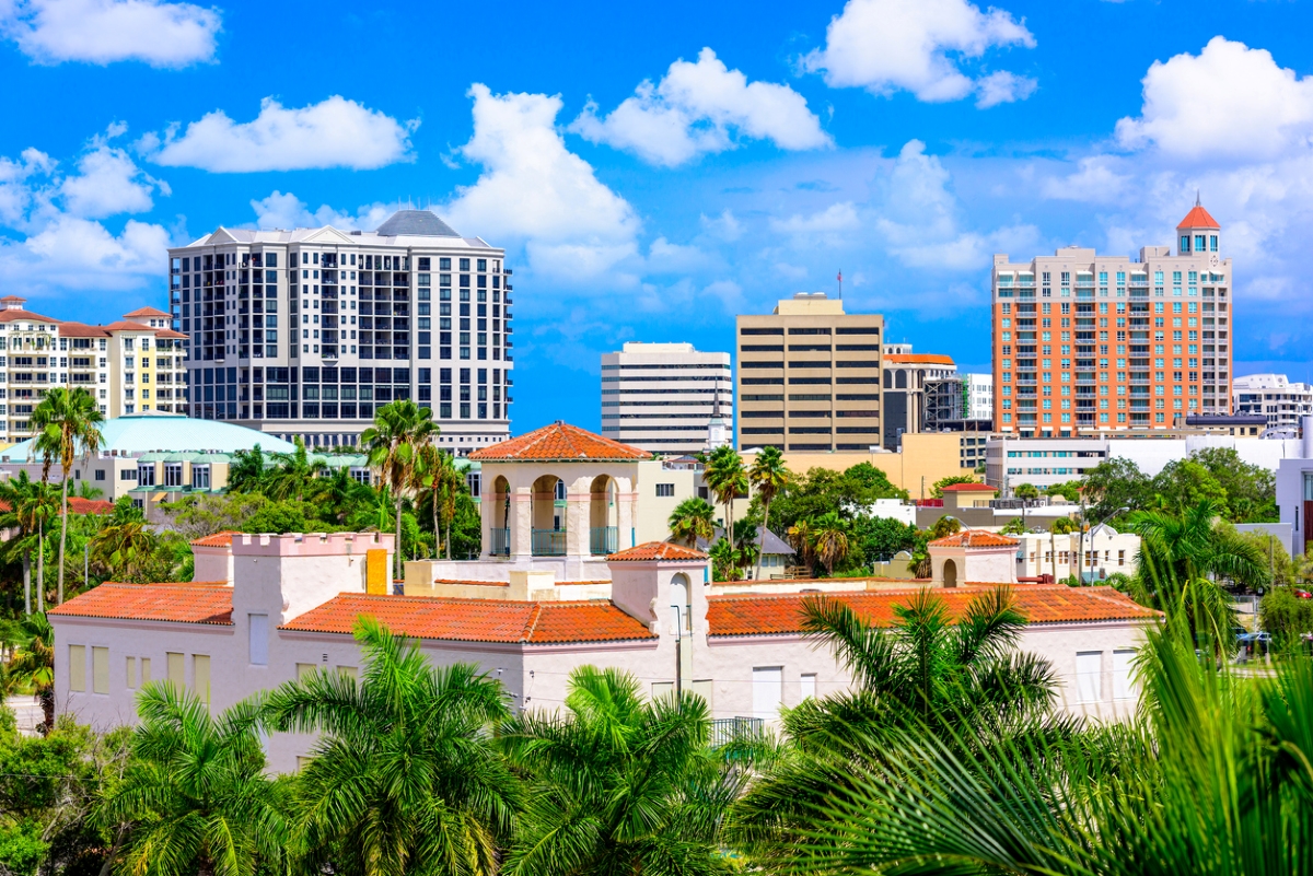 Sarasota Florida skyline with palm trees.