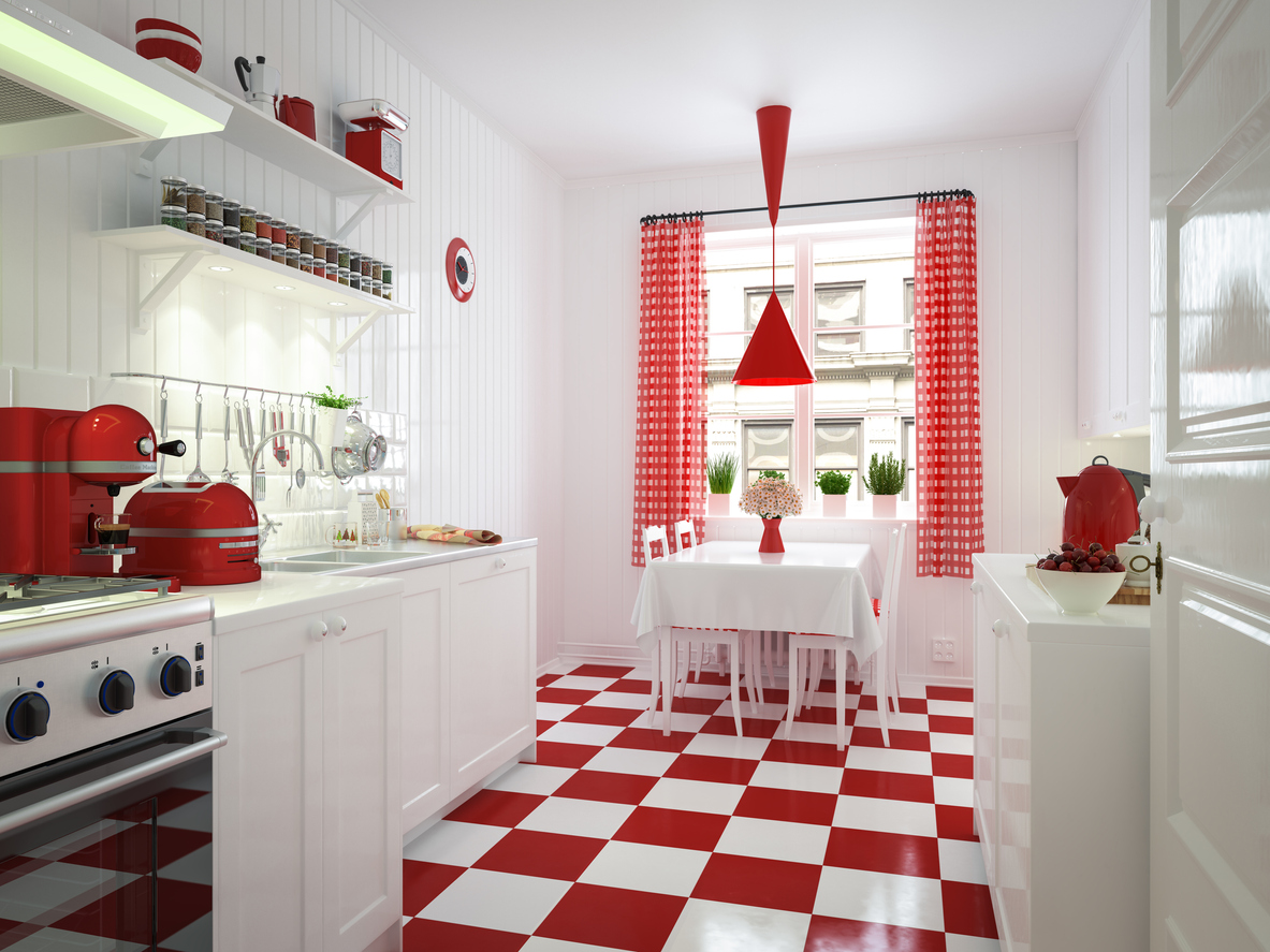 A-red-and-white-kitchen-has-red-and-white-checkerboard-floors.