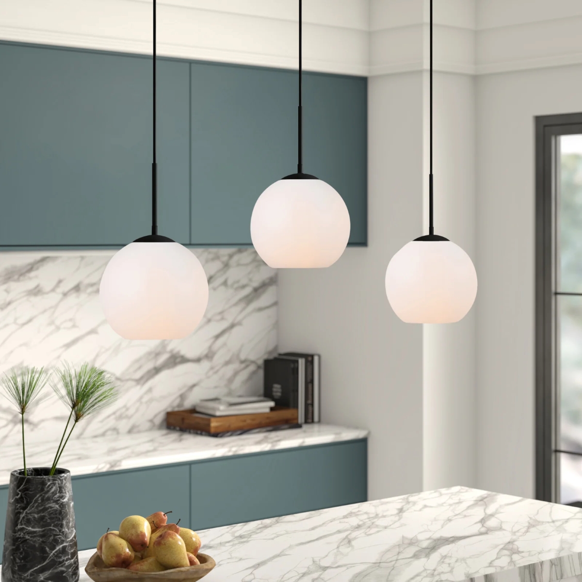 Frosted glass pendant lights in kitchen.