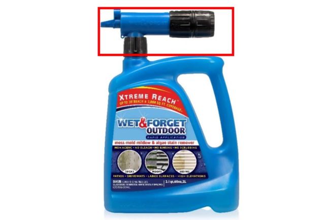 A blue bottle of mold and mildew remover has a nozzle at the top.