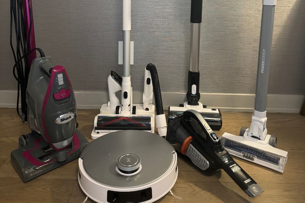 A group of The Best Vacuums For Apartments next to an apartment wall before testing.