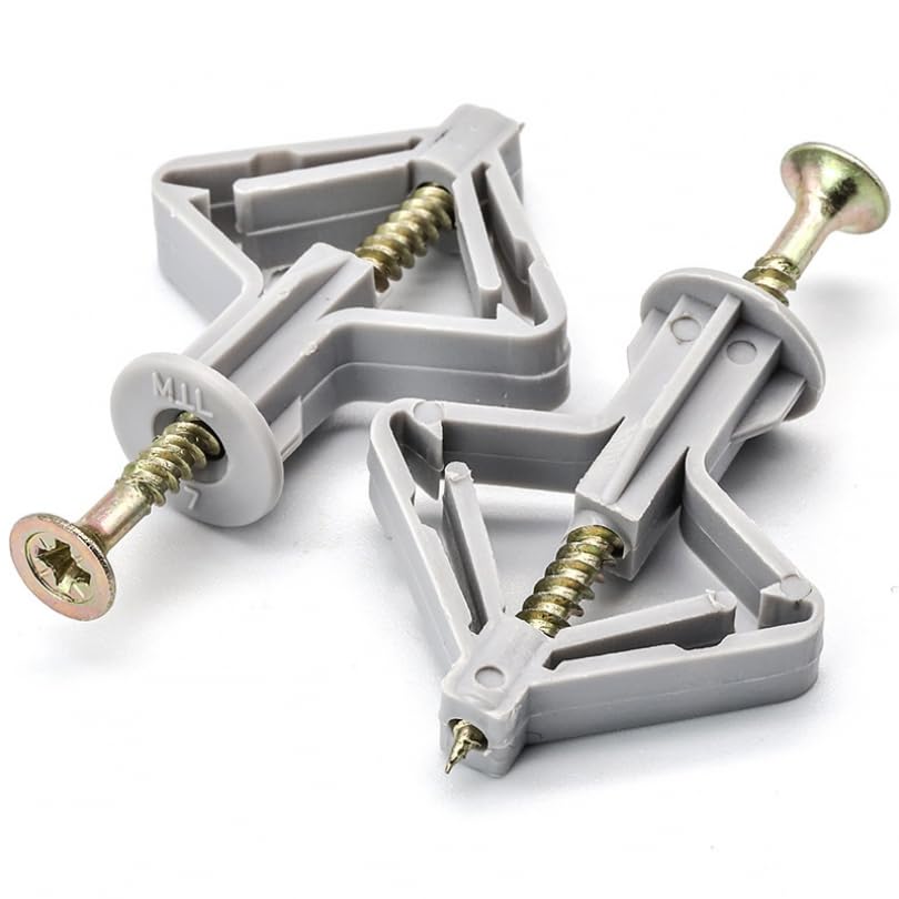 Expansion drywall anchors in front of a white background.