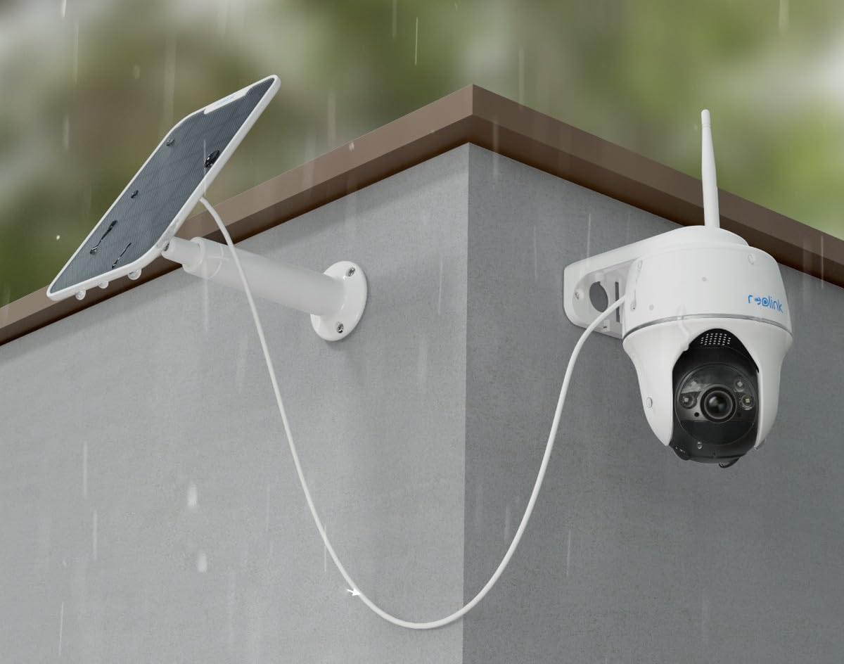 A close up of an outdoor security camera outside. 