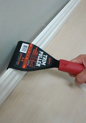 Removing Baseboard with a Trim Puller