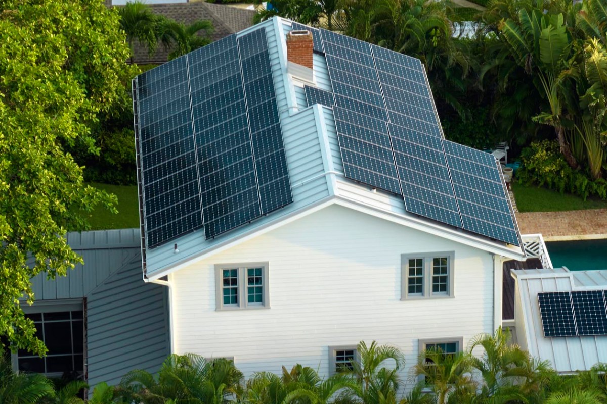 An aerial view of solar panels on a house. 