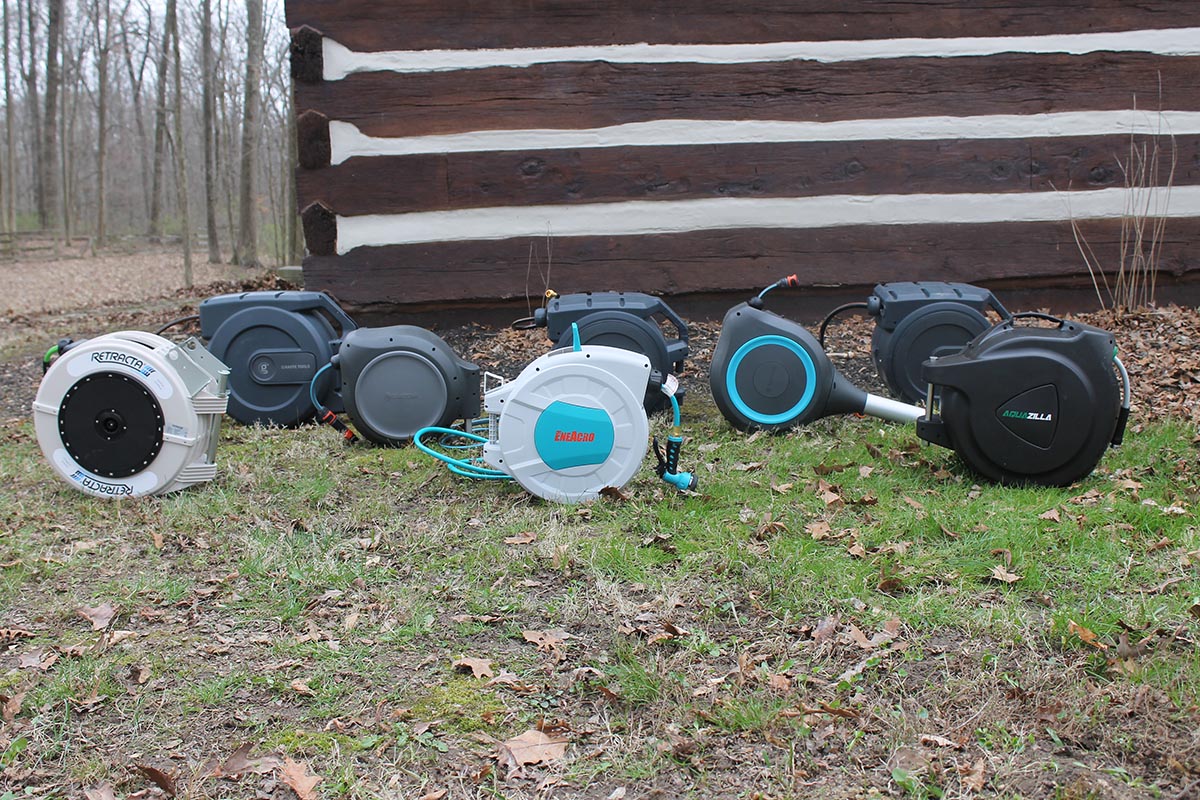 A group of the Best Retractable Garden Hose Reels together outside before testing.