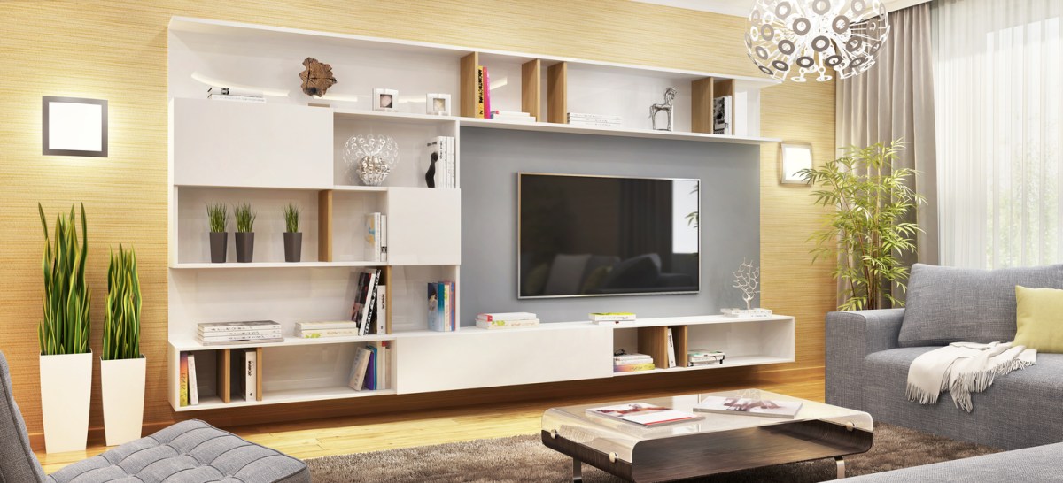 Flat-screen TV mounted in a white modern entertainment wall unit.