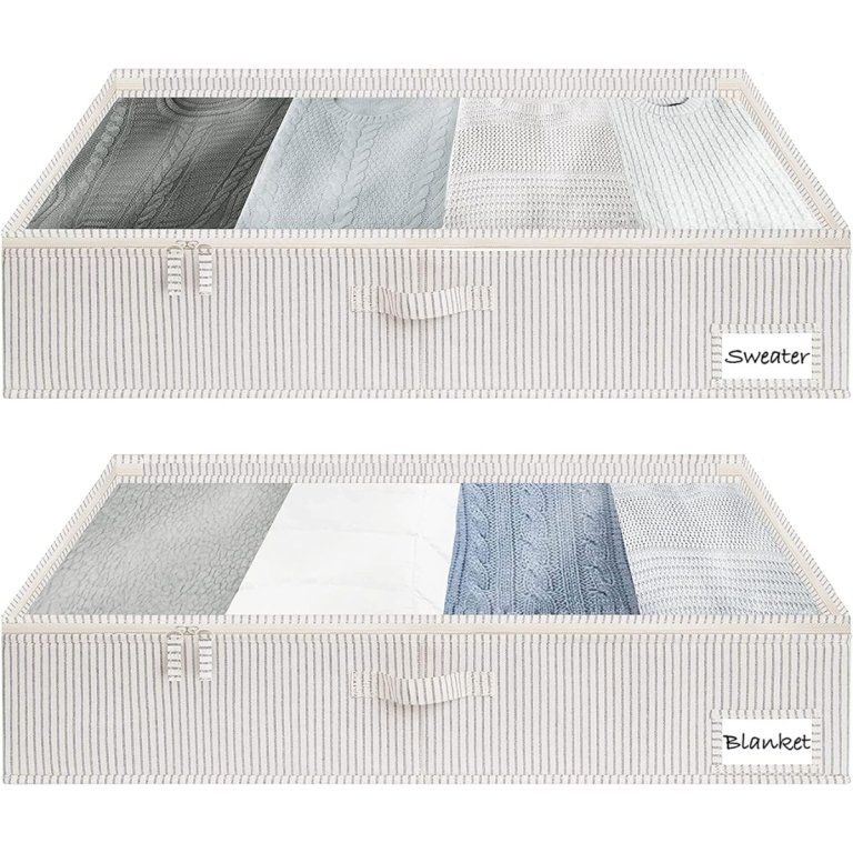  The StorageWorks 2-Pack Underbed Storage Boxes filled with clothing on a white background.