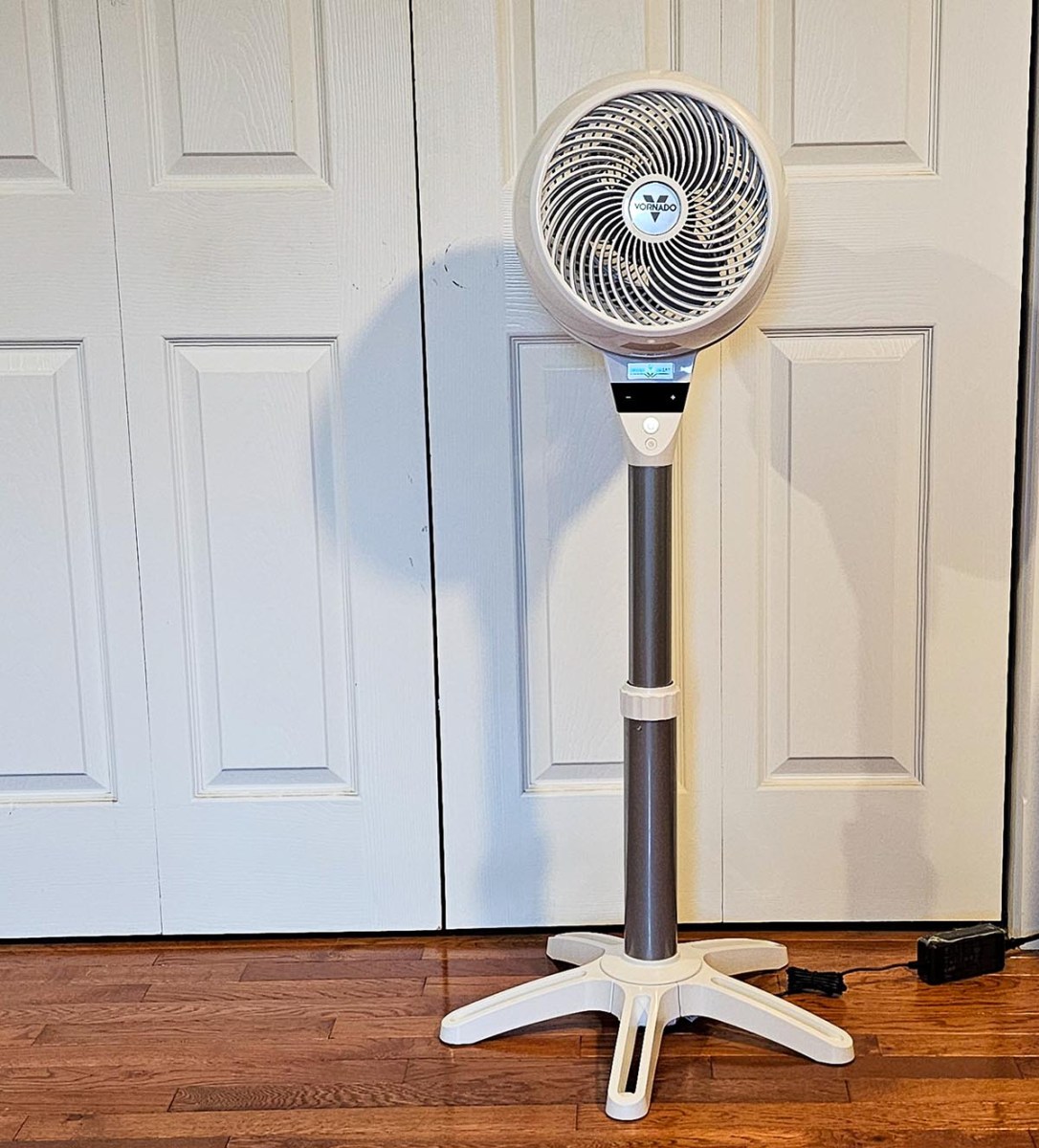 The Vornado pedestal fan in front of closet doors during testing.
