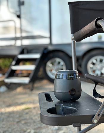 Thermacell Mosquito Repellent on the side table of a camping chair
